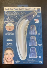 DERMASUCTION Pore Cleaning Device Vaccum Action Portable/Cordless NIB Glowing